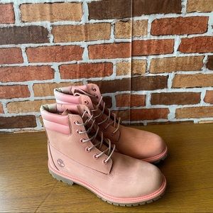 tan and pink timberlands